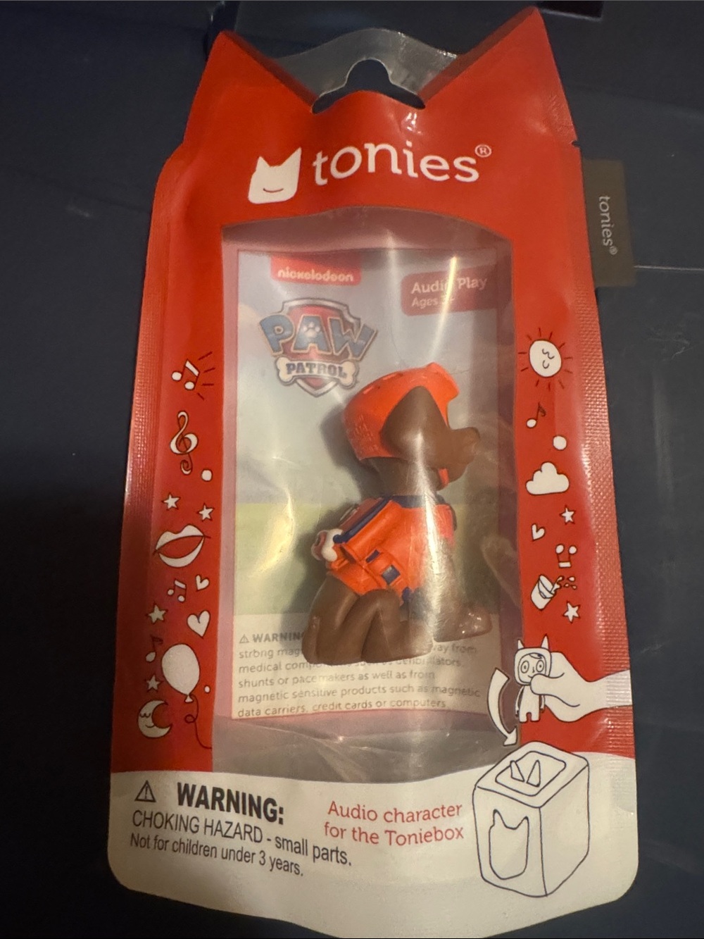Paw Patrol Red Packaging with Brown Character Illustration